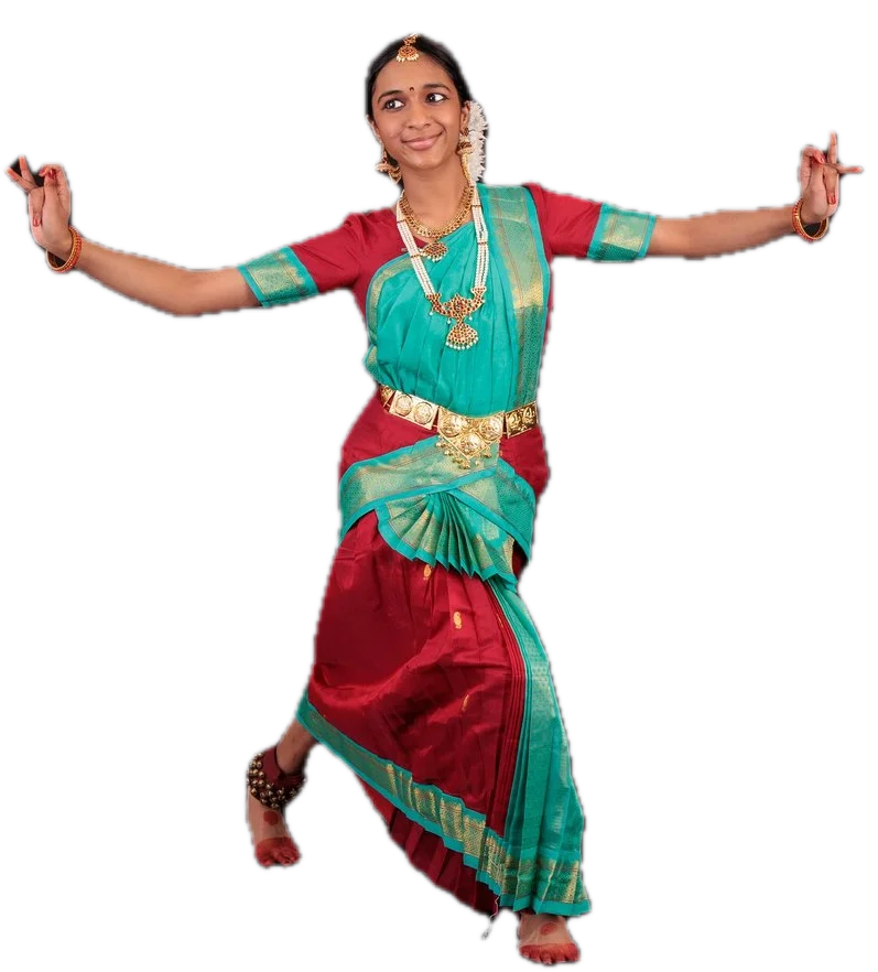 Shriya Natarajan in dynamic Bharatanatyam pose, arms wide